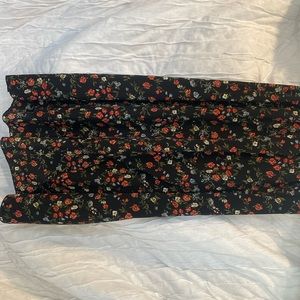 Skirt floral roses with blue flowers the skirts it’s self is black